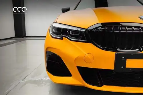 漫彩改色膜案例宝马三系车身贴膜亚面重金属橙金