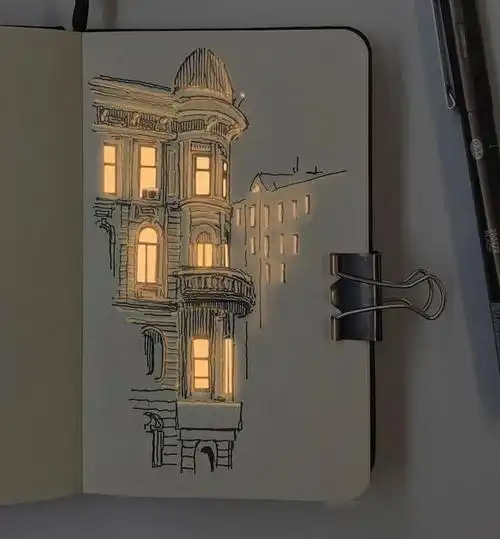 艺术家画素描建筑画好像带电一样灯光会从窗户透出来