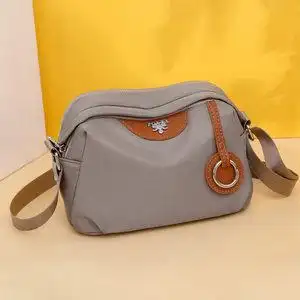 狄都尼龙单肩斜挎包女士妈妈斜跨帆布包女牛津布手提小包百搭2斜跨小