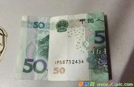 20桃心折纸中20元钱的折法五元人民币折纸教程520心形折纸50元部分100