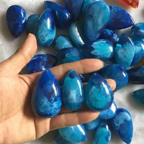 二代浮水荧光琥珀蜜蜡原石手工打磨抛光成品吊坠挂件批发