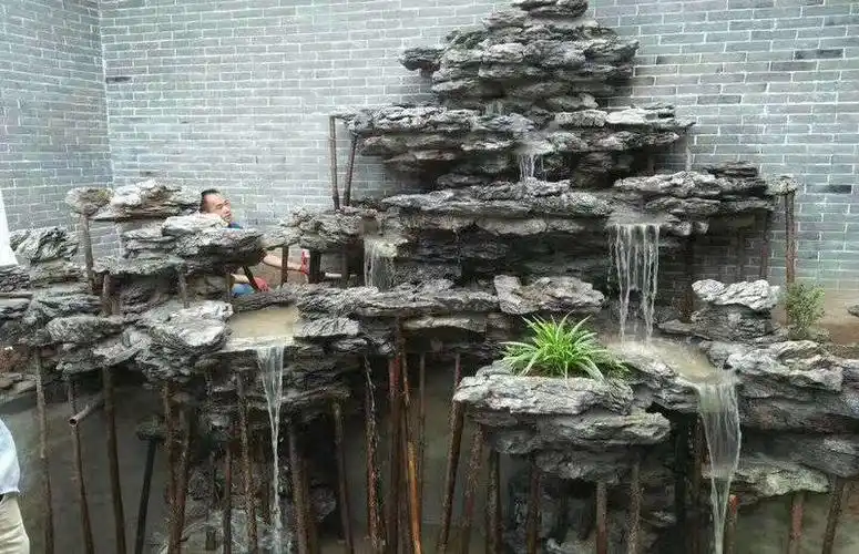 浙江杭州建德庭院假山风水设计,居家庭院假山制作,别墅假山怎样设计制