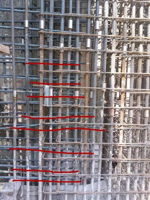 剪力墙转角处遇到暗柱时,水平筋要不要锚固,多少?