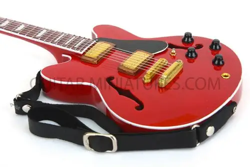 noel gallagher oasis red miniature guitar