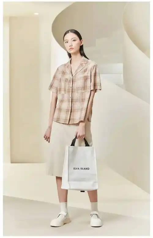 杭州轻奢女装艾娃22夏自然色系文艺棉麻风品牌折扣女装大码连衣裙批发