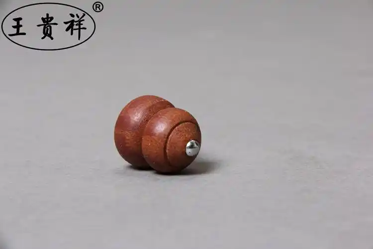 王贵祥 纯电木袖珍小陀螺