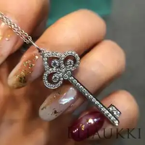 代购tiffany/蒂芙尼冠形项链18k白金鸢尾花吊坠钥匙满钻毛衣链女