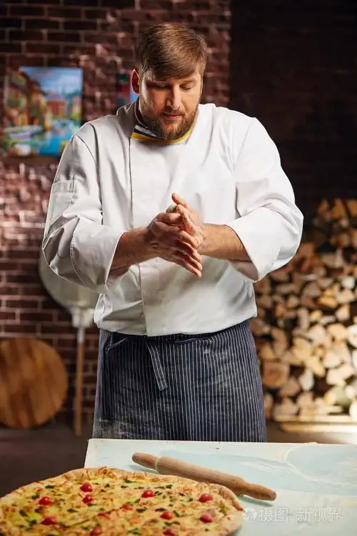厨师烹饪世界最好的比萨饼照片-正版商用图片0phak0-摄图新视界