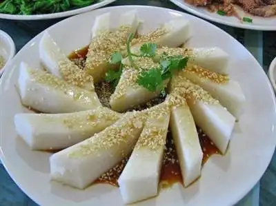 广东侨乡高州簸箕炊百年风味解乡愁