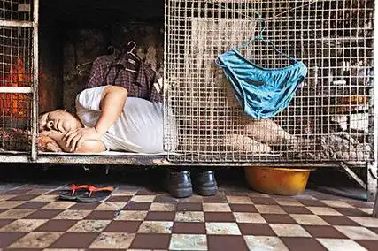 外国媒体看香港笼屋生活 穷人问题引关注(图)