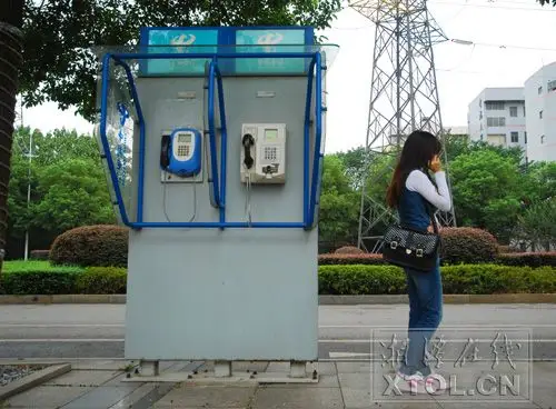 湘潭公用电话亭少有人问津 该何去何从(图)