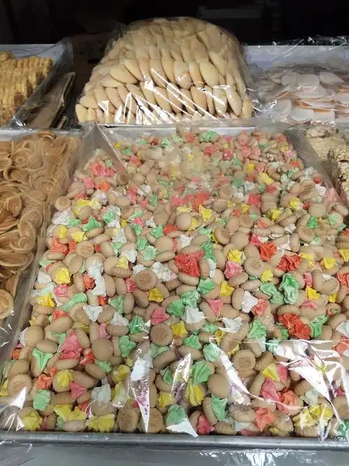 今天去赶集买了最喜欢的小饼干,就是没找到宝塔糖