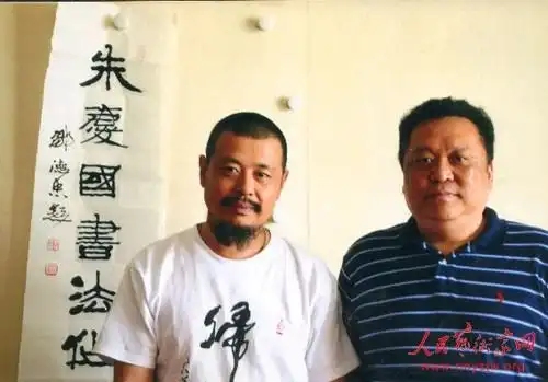 朱国庆与著名书法家大漠在一起.(编辑 吕晓岚)