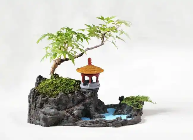 中国传统的经典水旱盆景也被研发成了量产的创意花盆,在外观像山石一