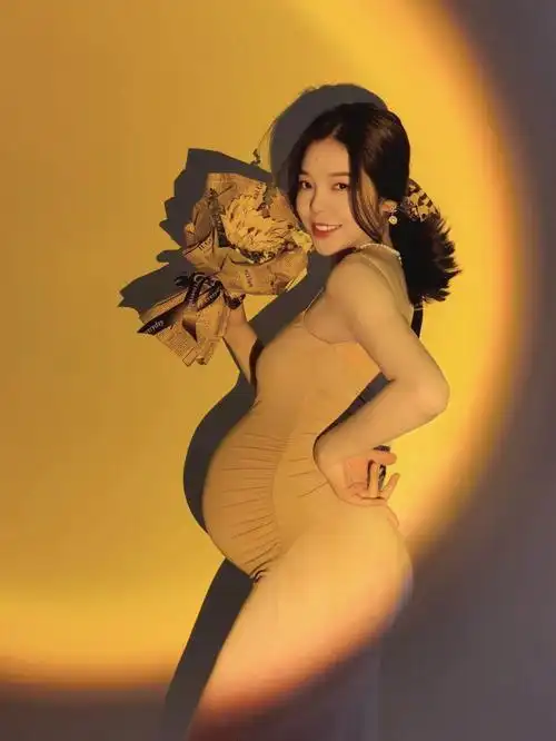 37w氛围感孕妇照一盏日落灯就够了