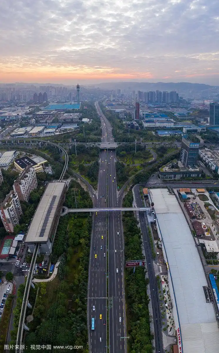 航拍重庆市渝北区金渝立交机场路地铁站日出俯视图