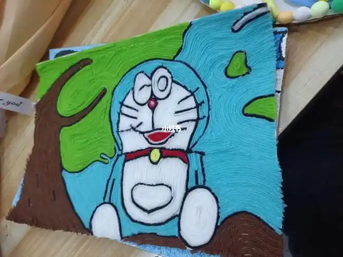 自己画的哆啦a梦,用毛线画粘的,你们可以用白乳胶#毛线手工  #哆啦a梦