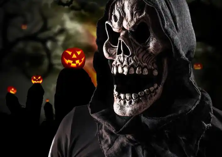 死神在黑暗的背景下万圣节背景