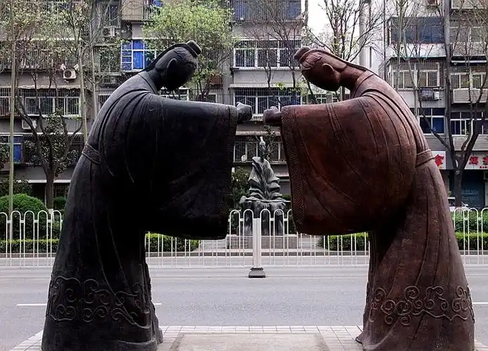 拱手作揖礼是中国传统行礼的一种形式,两手抱掌前推