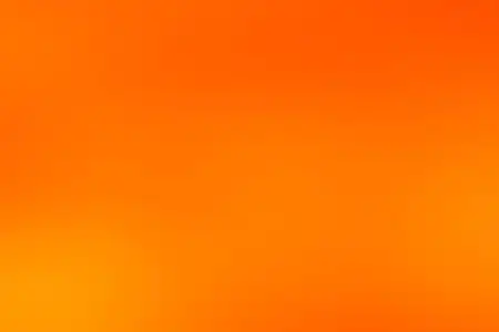 抽象柔和多彩的光滑模糊的纹理背景在金色, 黄色和橙色的色调色调照片