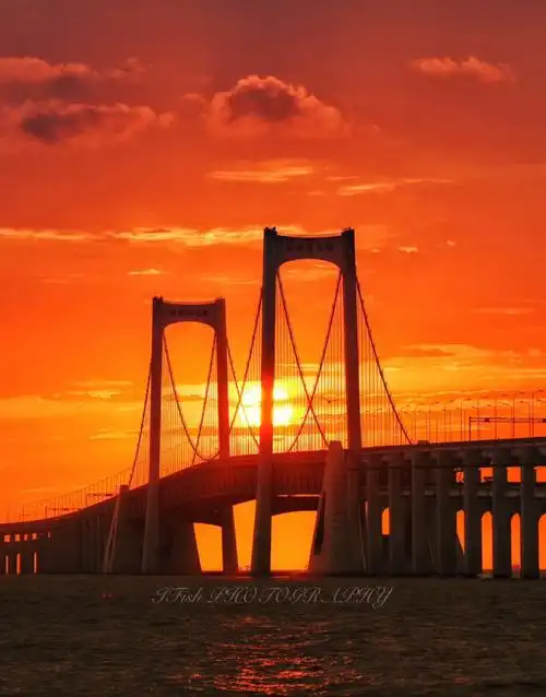 大连城市风景最佳cp星海湾大桥与日出