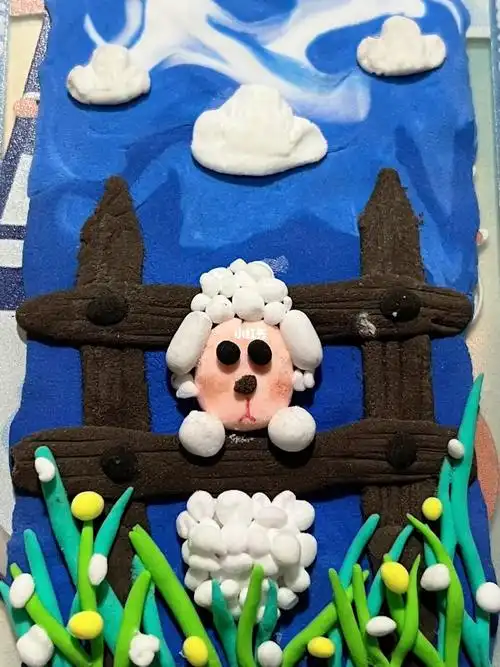 泥浮雕小羊和栅栏