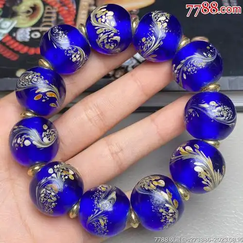 当前位置:>7788收藏__收藏热线>拍卖>琉璃饰品>回流老琉璃凤尾手链