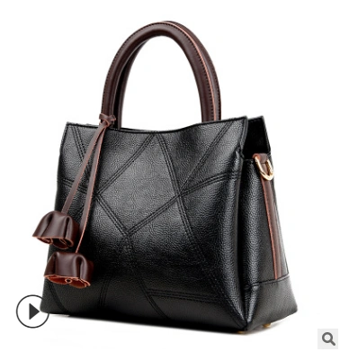 2018春夏新款手提真皮女包休闲时尚潮流绣线牛皮单肩斜跨流苏大包