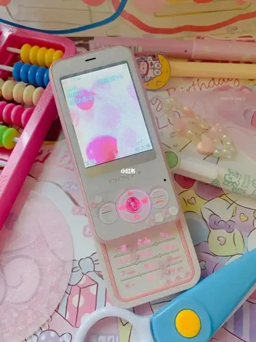 糖果粉滑盖手机