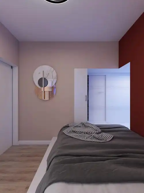 主卧墙面漆是业主自己选择的,奶茶色跟砖红色,两种颜色的一个碰撞,更