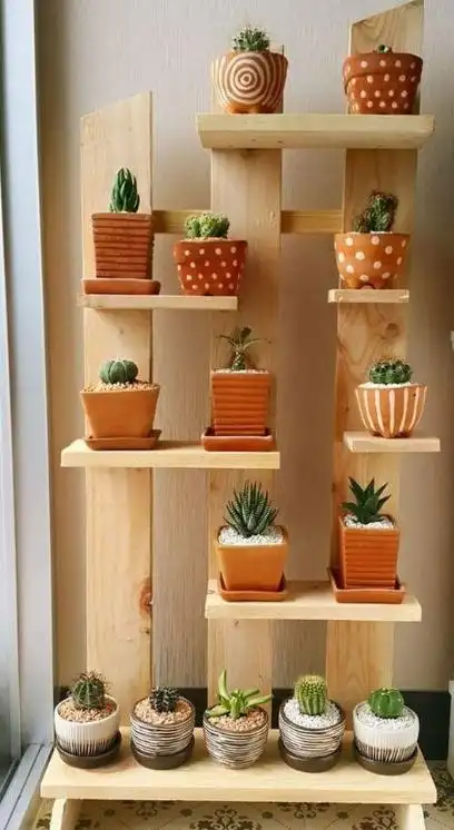 然后搭在架台上,这样一个简易的花架就做好了