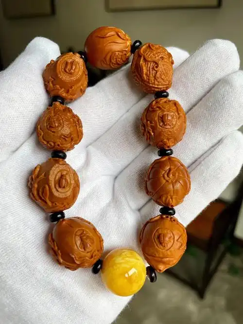 新入核雕手串八宝壶