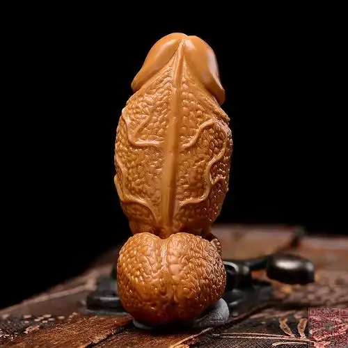 商品名称:橄榄核雕单籽单核 雄风 生命之根 苏工纯手工雕刻 s071