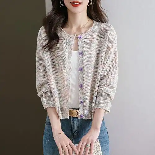 女士精品毛针织衫更新时间:2023年12月06日早秋镂空针织衫女开衫短款