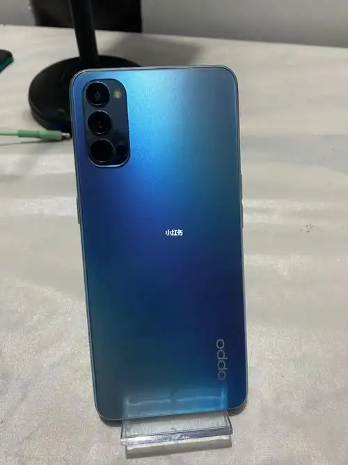 闲置opporeno4手机,5g手机,蓝色顶配版内存8 256g,屏幕左下角磕碰轻微