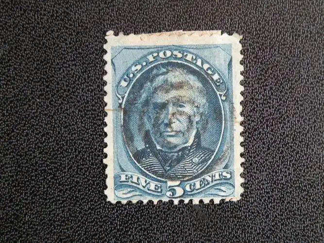 我有一枚美国1875年泰勒总统邮票请高师给看看现在值多少钱