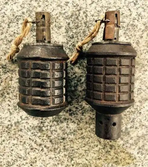 二战时日军的九七式手雷,为啥要先在头上敲一下,然后再扔出去?