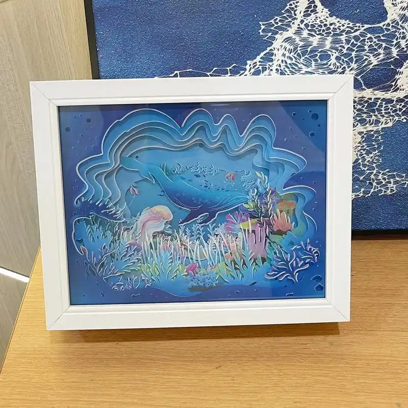 即是纸雕灯也是装饰画,用纸雕的的夜灯工艺品很能 - 抖音