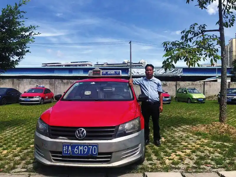 南宁市红木棉运输有限责任公司 供图出租车是城市一张流动的名片,是