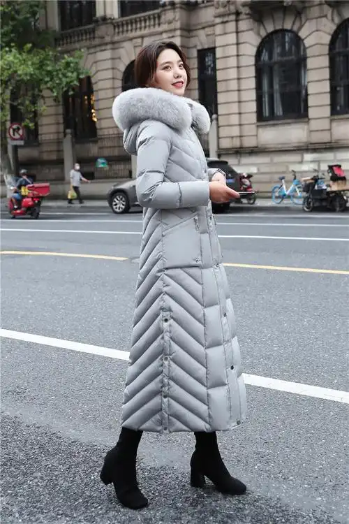 东北羽绒服加厚加长女款学生新款女长款过膝修身冬装黑色长到脚踝