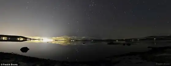 灯光和星星”.这是在挪威克瓦尔岛附近拍摄的夜空照片.