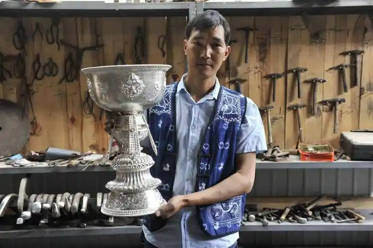 小锤敲过一千年这个展览让鹤庆非遗再次被看见