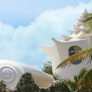 海螺贝壳屋采用当地传统材料建造,例如混凝土以及可回时纯俏海螺屋