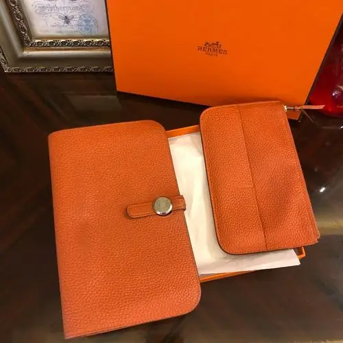 爱马仕经典橘色手拿包