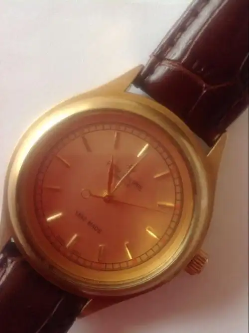求鉴定百达翡丽手表古董表 求鉴定真假,并估价