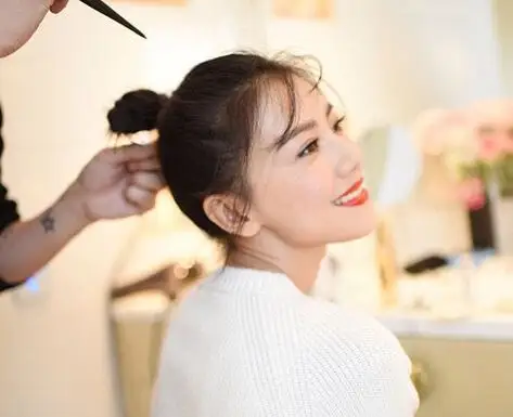 > 高圆圆丸子头怎么扎图片