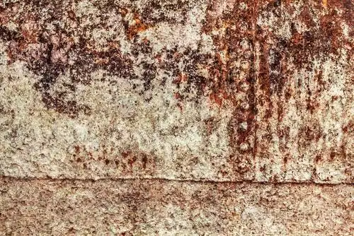 老生锈的破旧的焊接的铆接的金属的漂浮物表面德泰