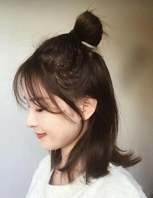 矮个子女生显高丸子头扎法 秋冬美人必备发型