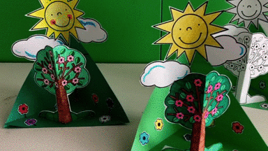 暖暖的阳光和开满花的树把美丽的春天记录在手工里有模板