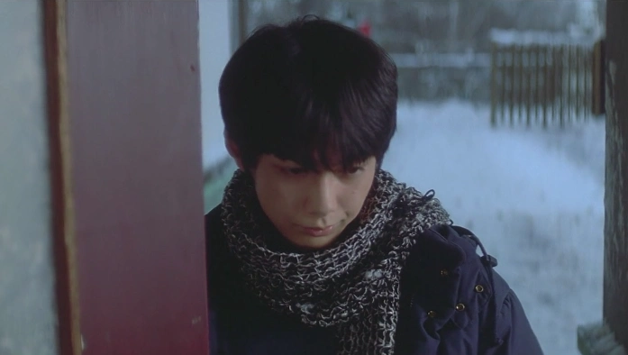 情书截屏男主藤井树柏原崇饰低头的时候撇嘴了